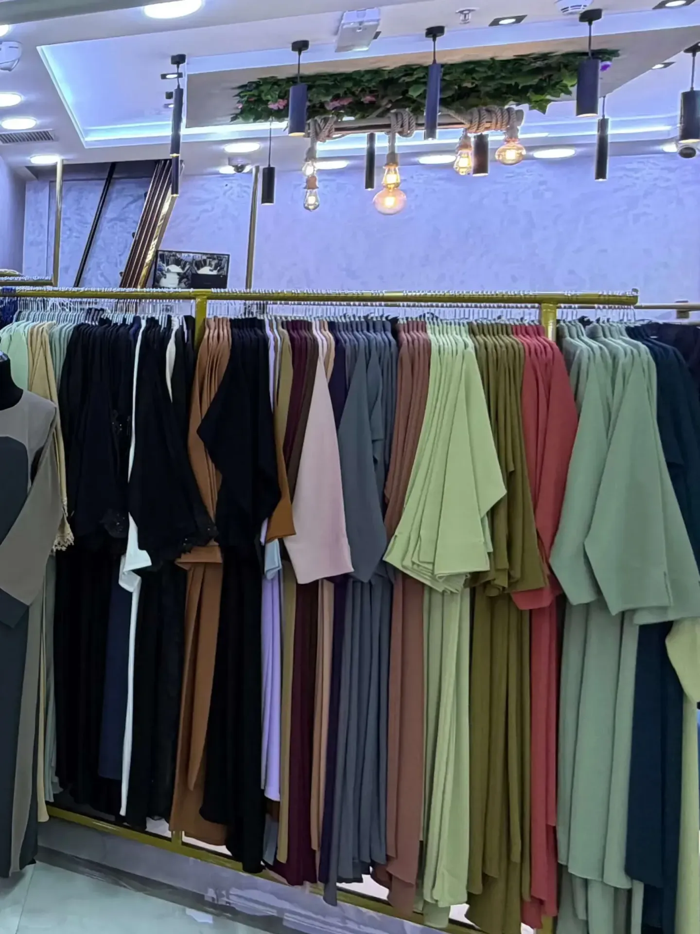 Rack of colorful apparel at a Salem Mall boutique